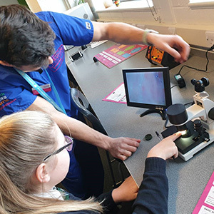 a pupil testing a piece of medical scanning equipment