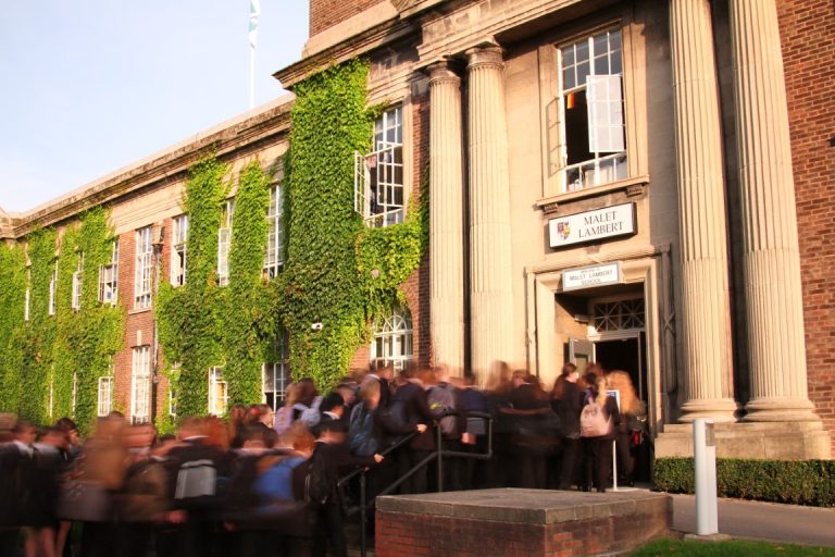 Pupils entering the old building